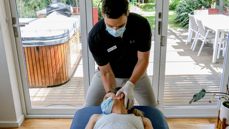 hands on technique for neck covid safe