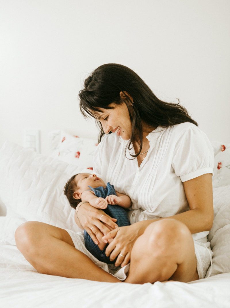 woman holding new baby